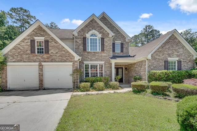 543 Serene Waters Trl, Jonesboro, GA 30236 - traditional-style home featuring brick siding, a front yard, concrete driveway, and roof with shingles