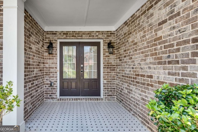 543 Serene Waters Trl, Jonesboro, GA 30236 - view of exterior entry featuring french doors and brick siding
