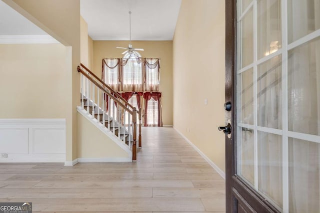 543 Serene Waters Trl, Jonesboro, GA 30236 - entryway featuring stairway, light wood-style floors, and ceiling fan