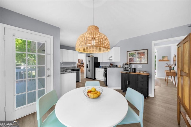 1359 Chatley Way, Woodstock, GA 30188 - dining space with wood finished floors and baseboards