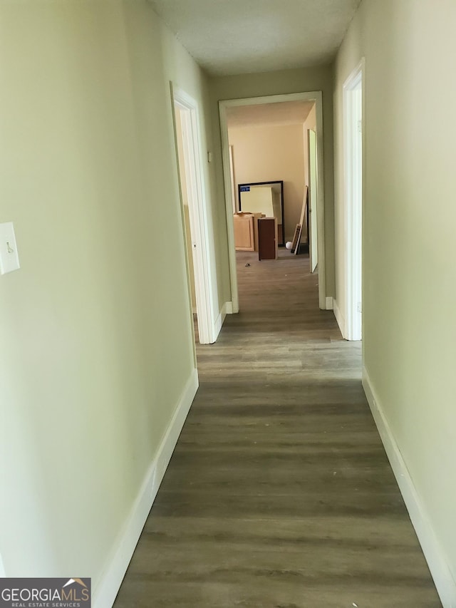 436 Woolfolk St, Macon, GA 31217 - corridor with baseboards and wood finished floors