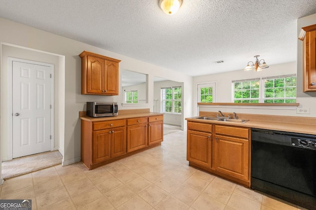 85 Old Gettysburg Way, Dallas, GA 30157 - kitchen featuring dishwasher, stainless steel microwave, a sink, brown cabinetry, and light countertops