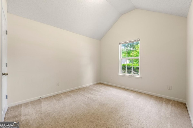 85 Old Gettysburg Way, Dallas, GA 30157 - unfurnished room featuring lofted ceiling, carpet, and baseboards