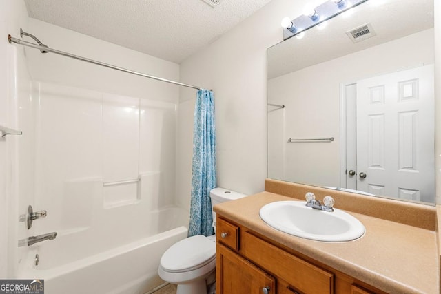 85 Old Gettysburg Way, Dallas, GA 30157 - full bath with toilet, shower / bathtub combination with curtain, vanity, and a textured ceiling