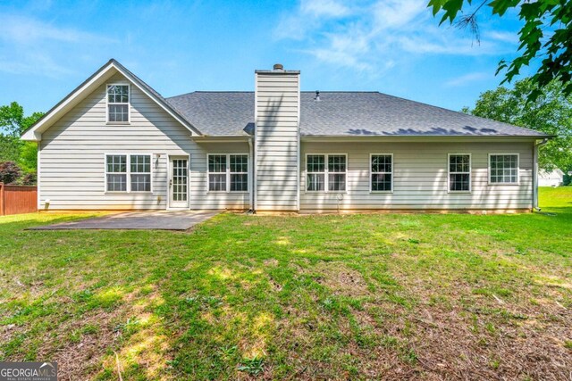85 Old Gettysburg Way, Dallas, GA 30157 - rear view of property with a patio area, a chimney, and a shingled roof