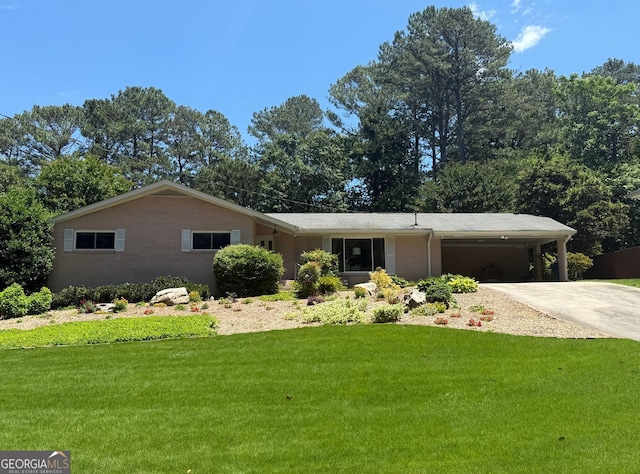 1533 High Haven Ct NE, Atlanta, GA 30329 - ranch-style home featuring concrete driveway, a front yard, and an attached carport
