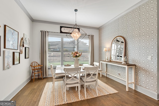 485 Delaperriere Loop, Jefferson, GA 30549 - dining room with wallpapered walls, crown molding, wood finished floors, and a chandelier