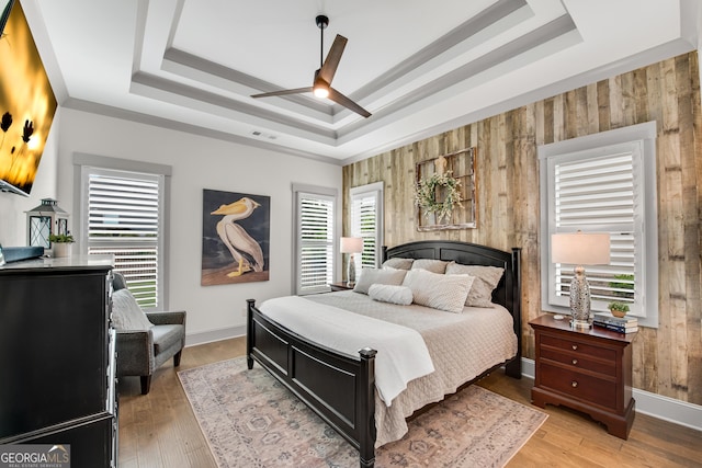 485 Delaperriere Loop, Jefferson, GA 30549 - bedroom with a raised ceiling, wooden walls, wood finished floors, and a ceiling fan