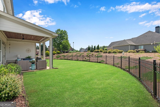 485 Delaperriere Loop, Jefferson, GA 30549 - fenced backyard featuring an outdoor hangout area