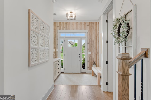 485 Delaperriere Loop, Jefferson, GA 30549 - foyer featuring light wood-style flooring and wooden walls