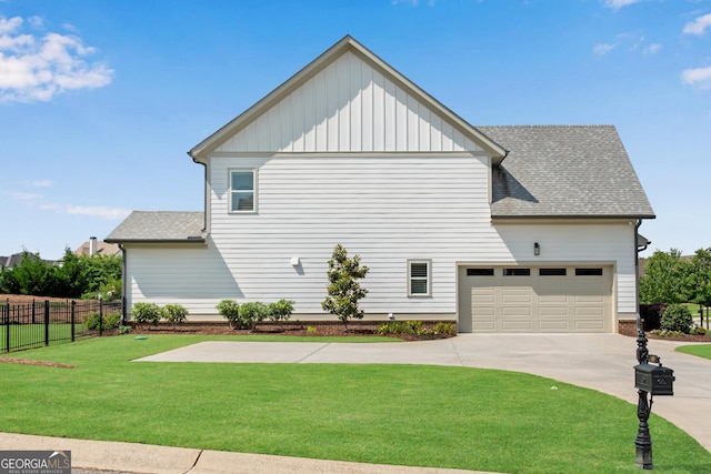 485 Delaperriere Loop, Jefferson, GA 30549 - view of side of property with concrete driveway, a garage, board and batten siding, and a shingled roof