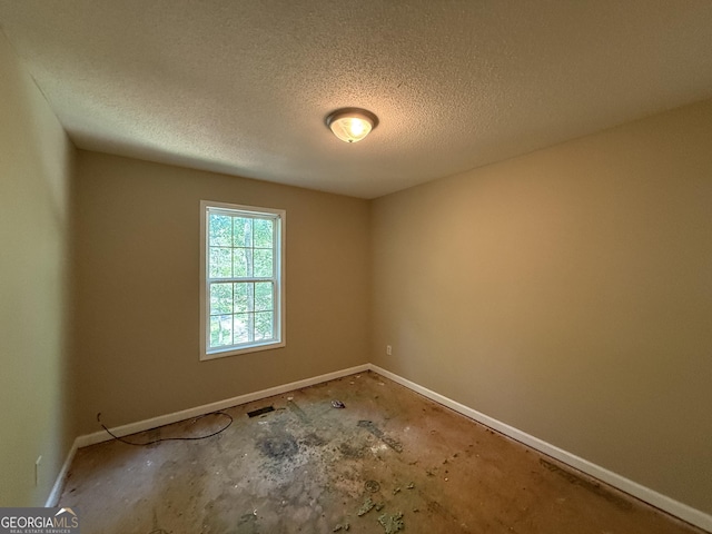 261 Sally Duke Dr, Whitesburg, GA 30185 - unfurnished room featuring a textured ceiling and baseboards