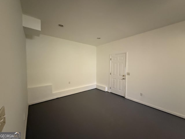 261 Sally Duke Dr, Whitesburg, GA 30185 - unfurnished room with finished concrete floors and baseboards