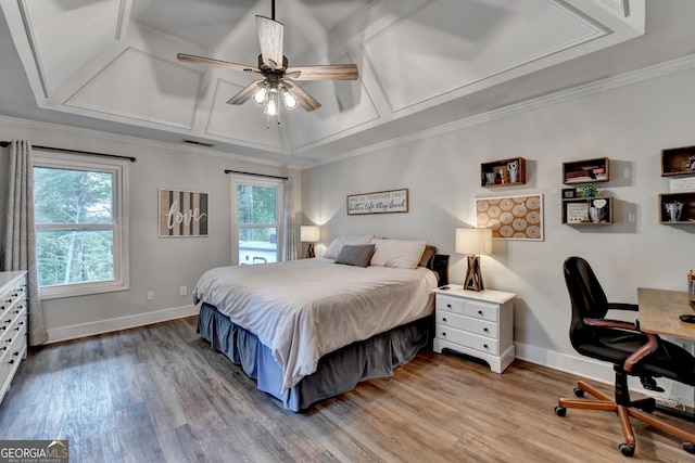 1882 Flowering Dr, Grayson, GA 30017 - bedroom with multiple windows, baseboards, wood finished floors, ornamental molding, and coffered ceiling