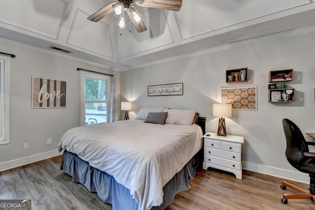1882 Flowering Dr, Grayson, GA 30017 - bedroom featuring baseboards, wood finished floors, a ceiling fan, and crown molding