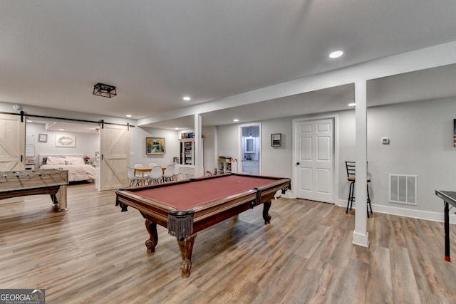 1882 Flowering Dr, Grayson, GA 30017 - recreation room with a barn door, light wood-style floors, recessed lighting, baseboards, and pool table