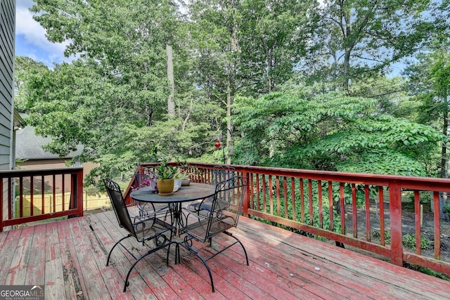 1882 Flowering Dr, Grayson, GA 30017 - wooden terrace featuring outdoor dining space