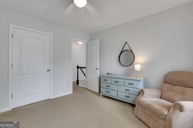 3980 Suwanee Place Dr, Suwanee, GA 30024 - living area featuring an upstairs landing, light carpet, a ceiling fan, and baseboards