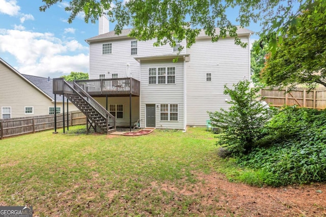 3980 Suwanee Place Dr, Suwanee, GA 30024 - back of property featuring a wooden deck, stairway, and a chimney