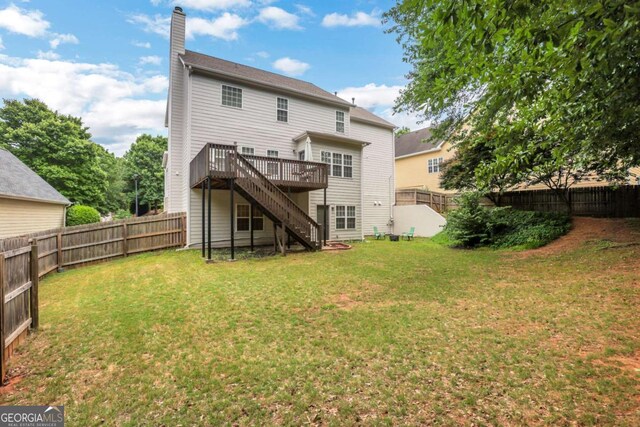 3980 Suwanee Place Dr, Suwanee, GA 30024 - back of house featuring stairway, a wooden deck, and a chimney