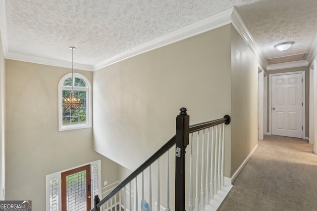 135 Clubhouse Dr NW, Kennesaw, GA 30144 - corridor with an upstairs landing, a textured ceiling, carpet, ornamental molding, and baseboards