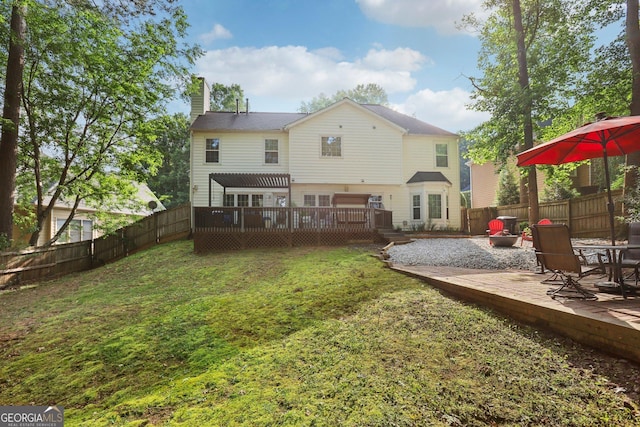 135 Clubhouse Dr NW, Kennesaw, GA 30144 - back of house with a deck and a chimney