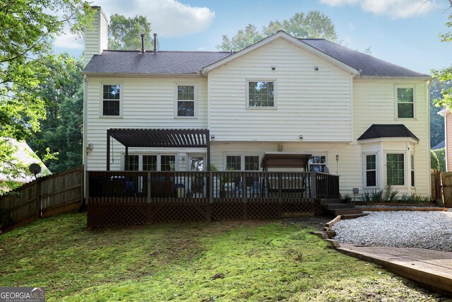 135 Clubhouse Dr NW, Kennesaw, GA 30144 - rear view of house with a deck, a chimney, and roof with shingles