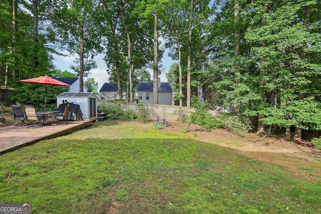 135 Clubhouse Dr NW, Kennesaw, GA 30144 - view of yard with a wooden deck
