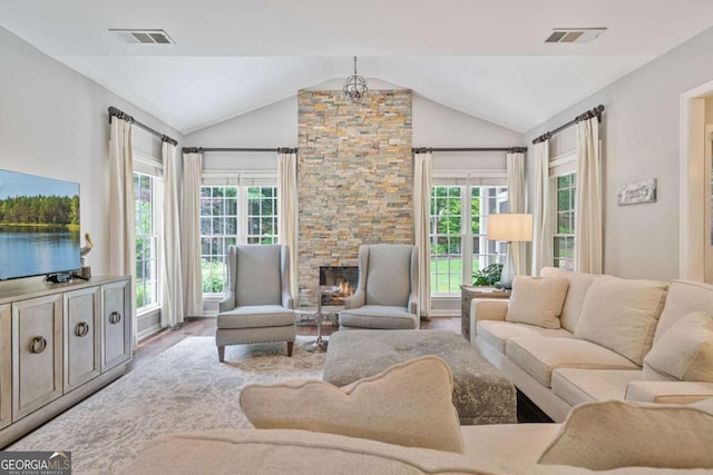 8045 Depford Way, Cumming, GA 30041 - living area featuring vaulted ceiling and wood finished floors
