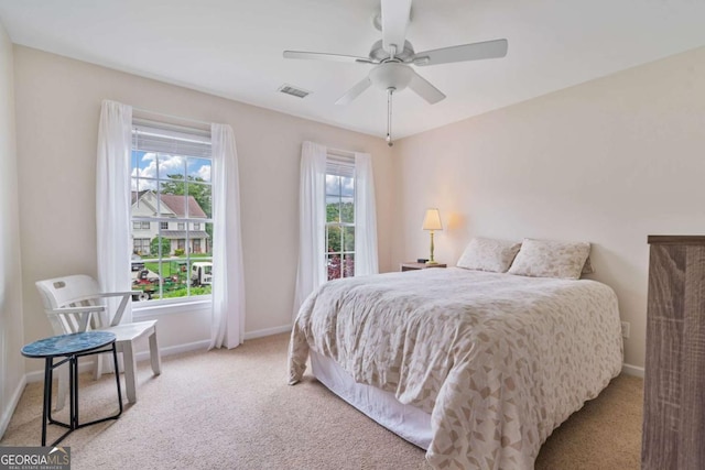 8045 Depford Way, Cumming, GA 30041 - carpeted bedroom featuring baseboards and a ceiling fan