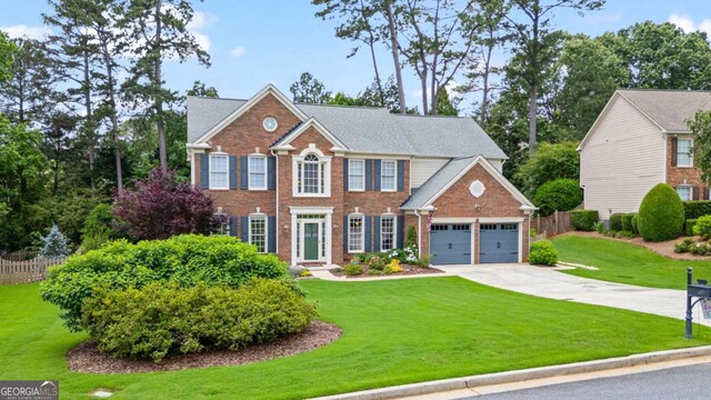 8045 Depford Way, Cumming, GA 30041 - colonial house featuring brick siding, concrete driveway, and a garage