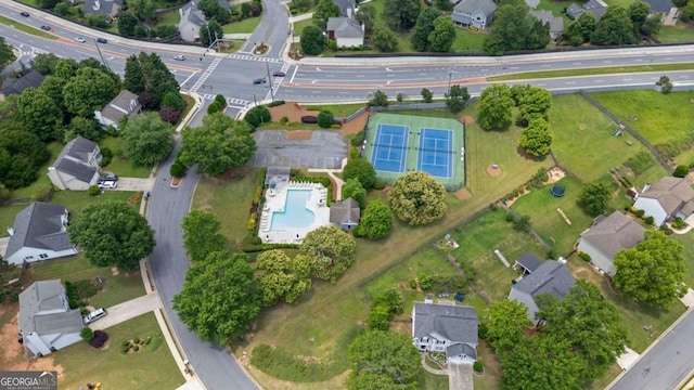 8045 Depford Way, Cumming, GA 30041 - aerial view of property and surrounding area with a pool and nearby suburban area