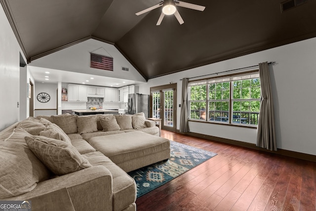 5995 Wellington Ave, Gainesville, GA 30506 - living room featuring lofted ceiling, a ceiling fan, hardwood / wood-style flooring, baseboards, and healthy amount of natural light