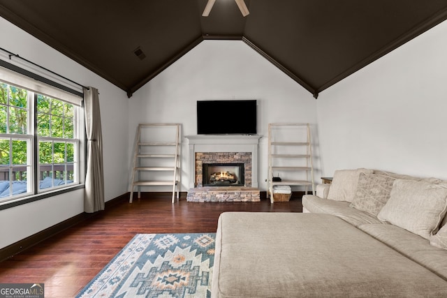 5995 Wellington Ave, Gainesville, GA 30506 - living area featuring dark wood-style floors, a fireplace, a ceiling fan, lofted ceiling, and baseboards