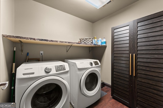 5995 Wellington Ave, Gainesville, GA 30506 - laundry room with washing machine and clothes dryer and wood finished floors