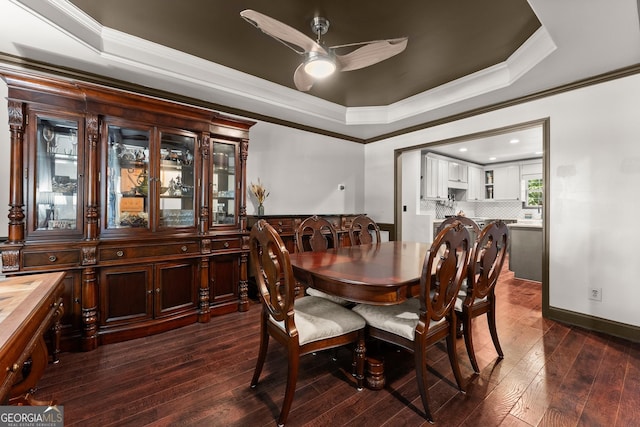 5995 Wellington Ave, Gainesville, GA 30506 - dining area with a tray ceiling, a ceiling fan, crown molding, dark wood-style floors, and recessed lighting