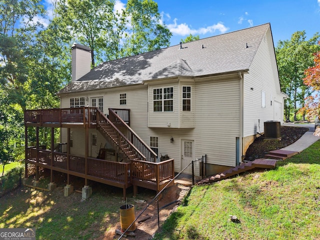 5995 Wellington Ave, Gainesville, GA 30506 - rear view of property featuring a wooden deck, a chimney, central AC, a yard, and stairway