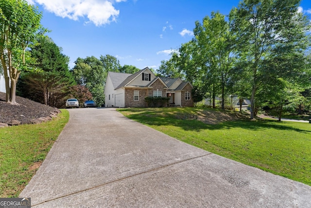 5995 Wellington Ave, Gainesville, GA 30506 - view of front of home with driveway, brick siding, and a front yard