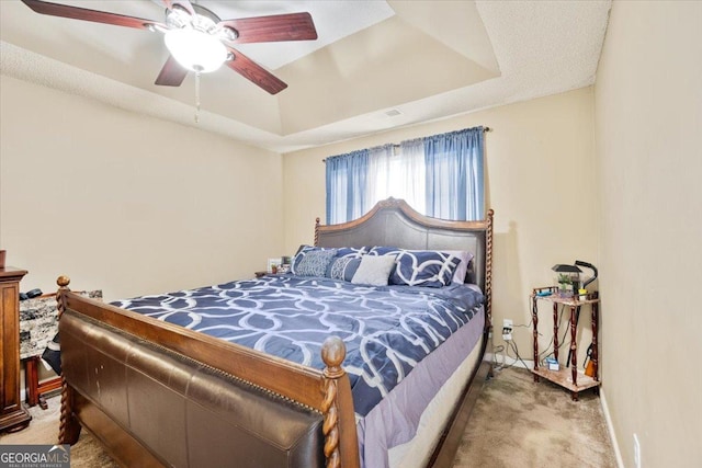 160 Country Mill Ln, Stockbridge, GA 30281 - bedroom featuring a raised ceiling, carpet, and a ceiling fan