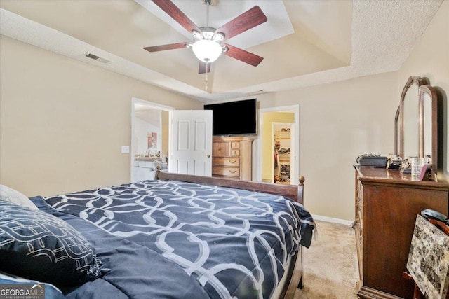 160 Country Mill Ln, Stockbridge, GA 30281 - bedroom with a tray ceiling, light colored carpet, baseboards, and ceiling fan
