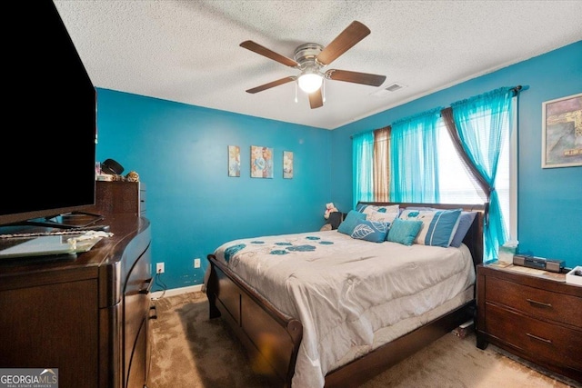 160 Country Mill Ln, Stockbridge, GA 30281 - bedroom with light colored carpet, a textured ceiling, ceiling fan, and baseboards