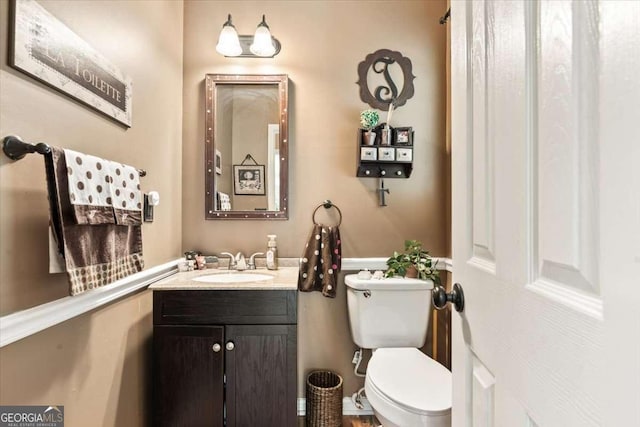 242 Sandhurst Ct, Suwanee, GA 30024 - half bathroom with toilet and vanity