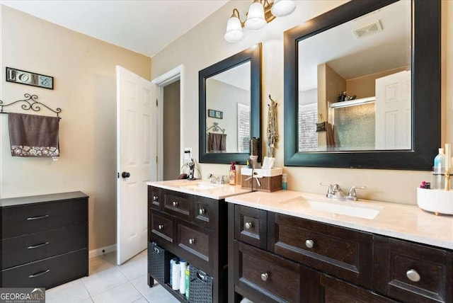 242 Sandhurst Ct, Suwanee, GA 30024 - bathroom with vanity, tile patterned floors, and a stall shower