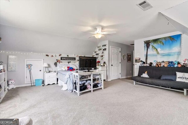 242 Sandhurst Ct, Suwanee, GA 30024 - carpeted living area featuring ceiling fan and baseboards