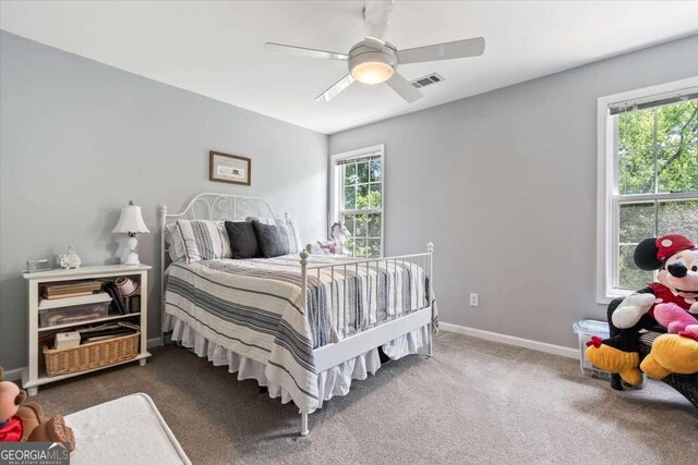 242 Sandhurst Ct, Suwanee, GA 30024 - bedroom featuring carpet, ceiling fan, and baseboards