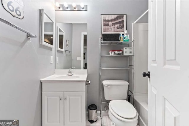 242 Sandhurst Ct, Suwanee, GA 30024 - bathroom with vanity, toilet, and  shower combination