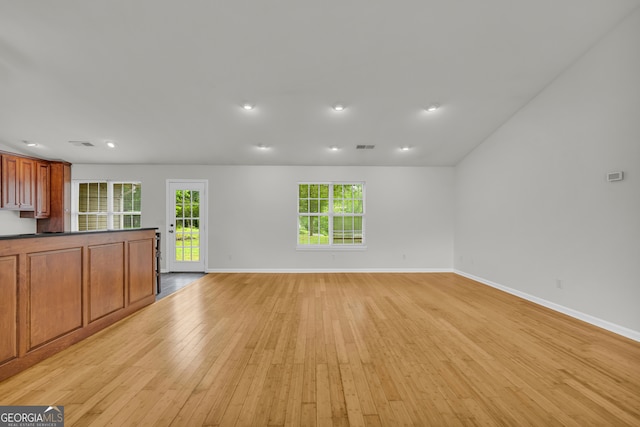 464 Old Camp Creek Rd, Cornelia, GA 30531 - unfurnished living room featuring light wood finished floors, plenty of natural light, baseboards, and recessed lighting