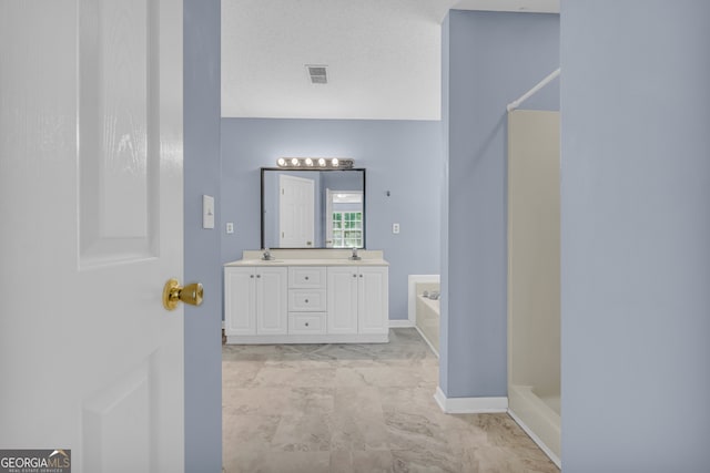 464 Old Camp Creek Rd, Cornelia, GA 30531 - full bath featuring double vanity, a stall shower, marble look tile flooring, and baseboards