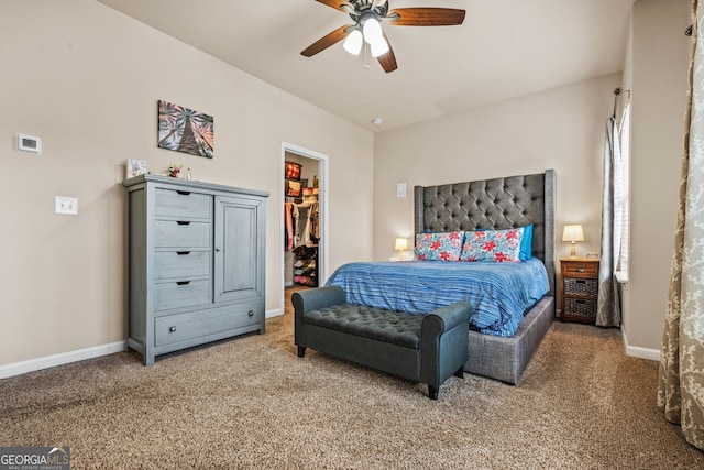 881 Ash St, Canton, GA 30114 - carpeted bedroom with a walk in closet and ceiling fan