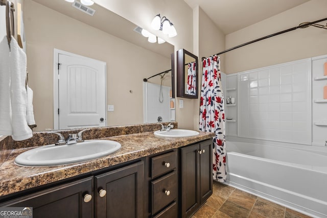 881 Ash St, Canton, GA 30114 - full bathroom with double vanity, shower / bathtub combination with curtain, and stone finish floors